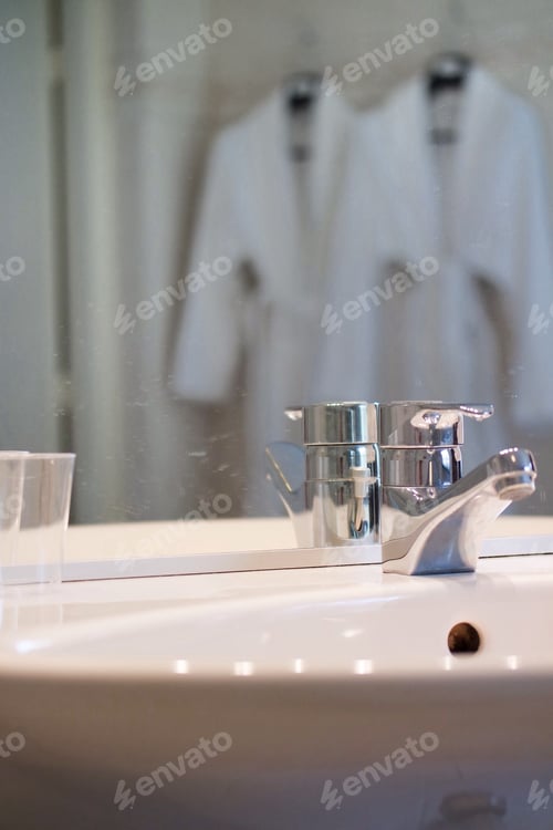 Preview: hotel bathroom sink.