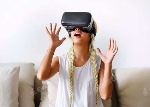 Preview: A young woman trying on VR headset