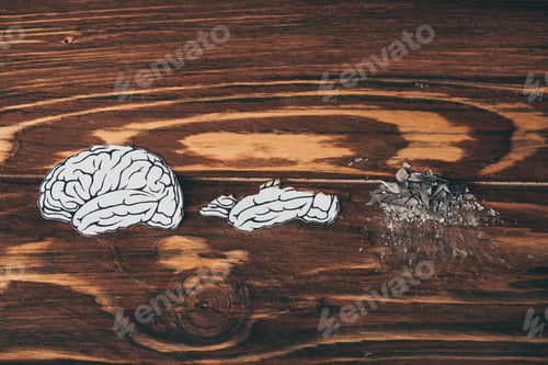 Preview: top view papers with brain disease as dementia symbol on wooden table