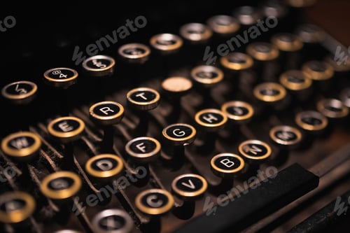 Preview: Old typewriter on a wooden table