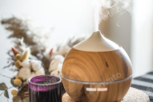 Preview: Modern oil aroma diffuser close up on a blurred background.