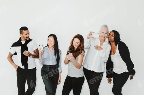 Preview: Diverse people taking a selfie of themselves with their phone