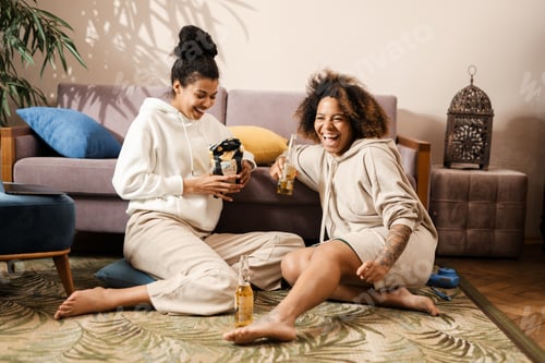 Preview: Three happy multiethnic women friends