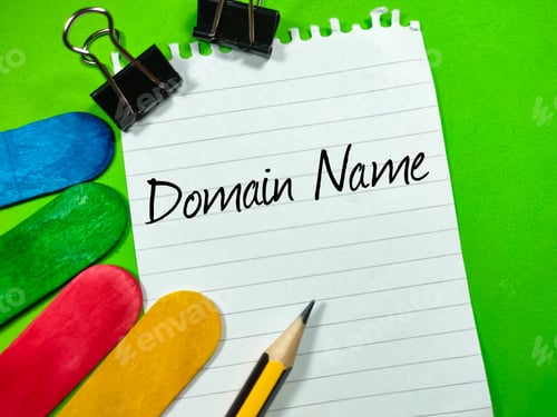 Preview: Business concept.Text Domain Name writing on notepaper.
