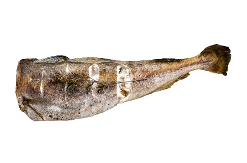 Preview: Roasted cod white fish with thyme on marble board. Isolated on white background