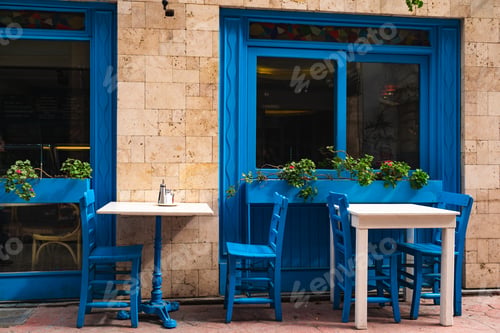 Preview: Street cafe in blue tones, empty tables in Istanbul
