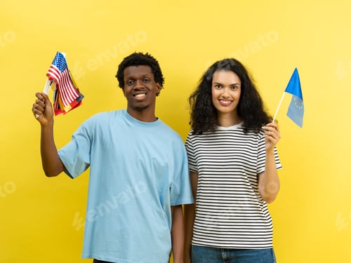 Preview: Happy Multicultural Couple Holding American and European Flags