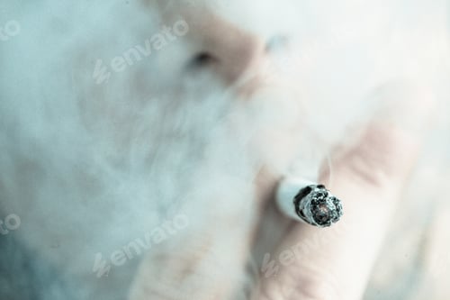 Preview: Man smoking out himself with a cigarette
