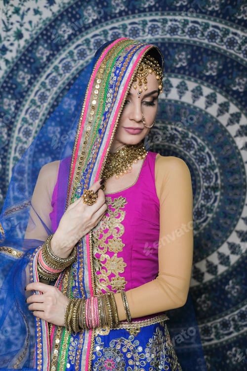 Preview: Portrait Of A Female Model In Ethnic Indian Costume With Jewellery And Traditional Makeup.