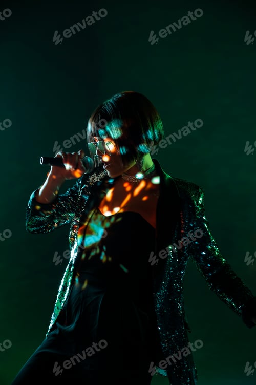 Preview: Stylish woman singing on stage
