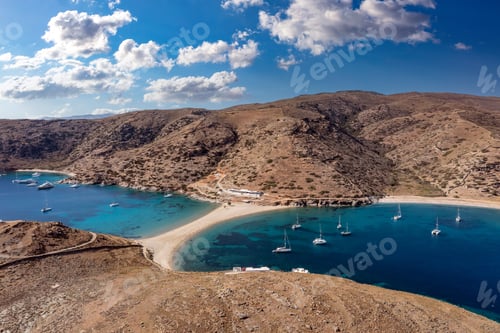 Preview: Kolona Fykiada double sided sandy beach, aerial drone view. Greece, Kithnos island, Cyclades.