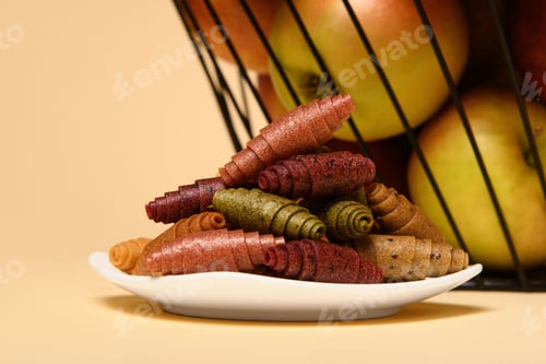 Preview: In the background is a basket of fruits. A white plate with pastilla.