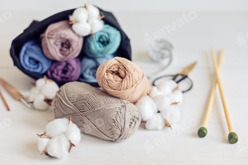 Preview: Craft hobby background with yarn in natural colors