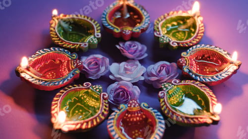 Preview: Bright Diwali candle flames during celebration night