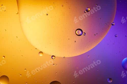 Preview: Beautiful abstract background from mixed water and oil in orange and purple color
