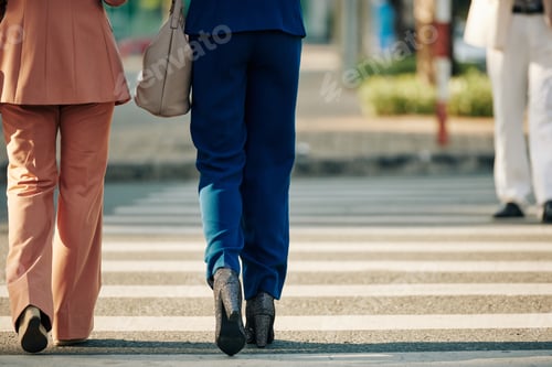 Preview: Businesswomen crossing road