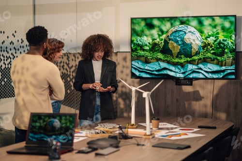 Preview: Diverse staff at eco friendly workspace and working on sustainability.