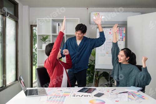 Preview: Joy and Achievement. Team members celebrate their project's success with enthusiasm.