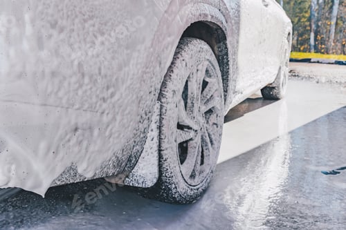 Preview: Сar wash self-service. Car vehicle with white foamy detergent. Automobile cleaning self service