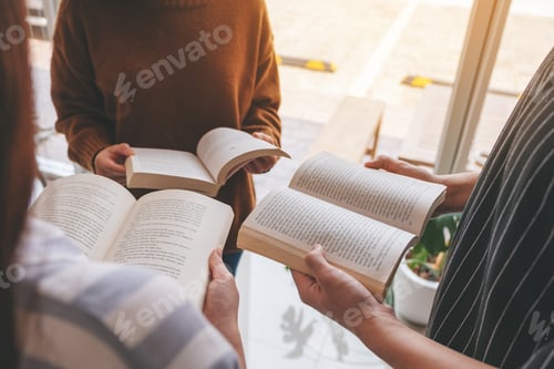 Preview: Three young people standing in circle and enjoyed reading books together