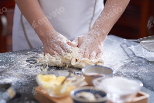 Preview: Female Hands Kneading Dough