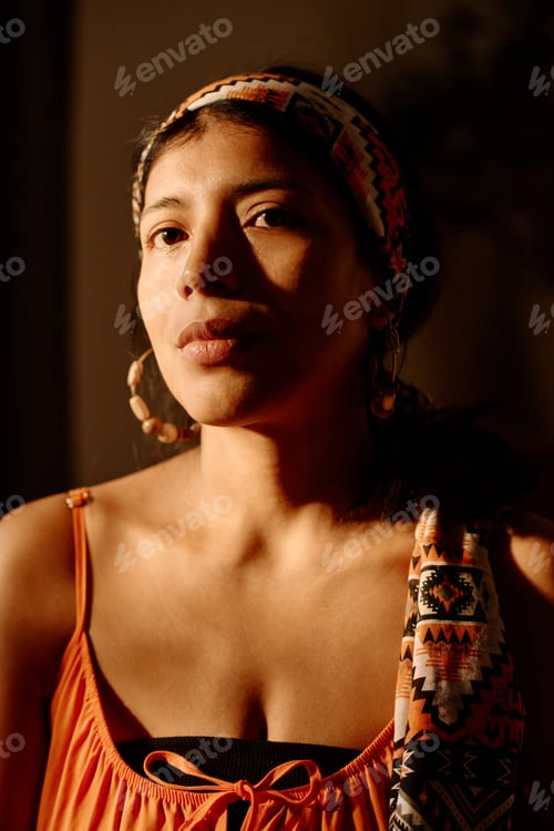 Preview: Woman in ethnic headscarf and earrings