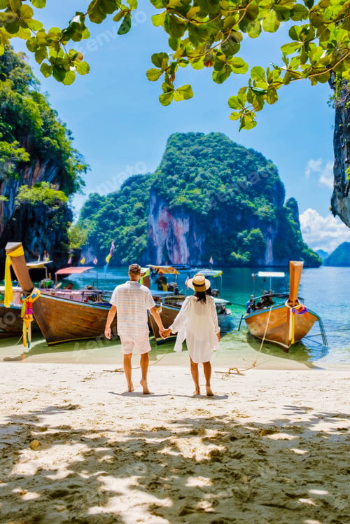 Preview: Couple on a boat trip to the Tropical lagoon of Koh Loa Lading Krabi Thailand part of Koh Hong
