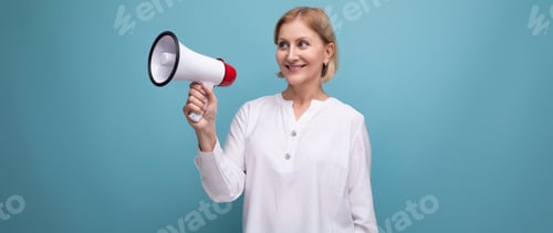 Preview: mature woman with blond hairstyle speaks important news with loudspeaker
