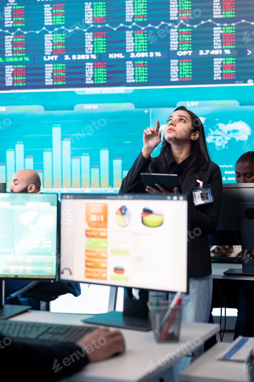 Preview: Team of forecast affiliates examining annual infographics on a big data screen