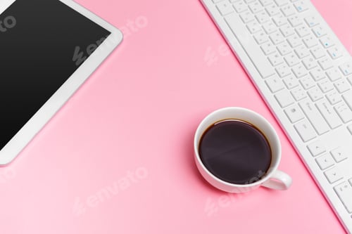 Preview: Woman's pink creative workspace with computer keyboard and supplies, top view
