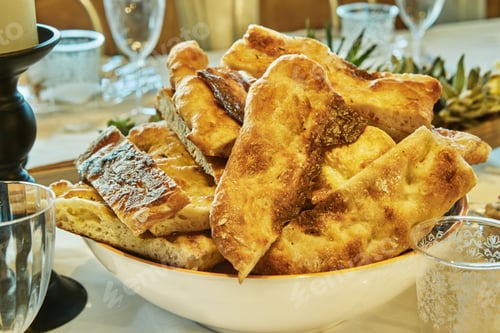 Preview: Table setting with focaccia bread and candles
