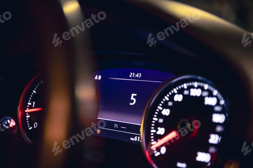 Preview: Close-up, car speed indicators in a car at night.