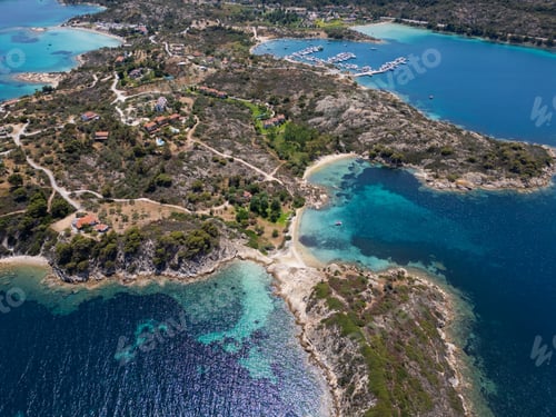 Preview: Aerial view of an island on Sithonia Peninsula, Greece, with beaches and rocks, surrounded by