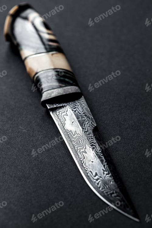 Preview: Hunter knife with wooden handle on a dark background