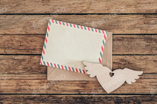 Preview: Blank postcard on wooden background, top view, copy space.