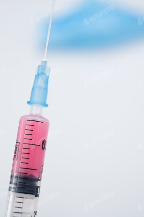 Preview: Isolated respiratory mask and syringe on a white background