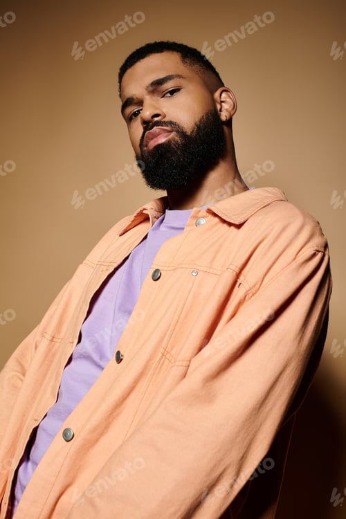 Preview: Stylish African American Man in Vibrant Orange Shirt