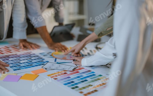 Preview: Startup team collaborates on color selection for user centric product design, optimizing experience