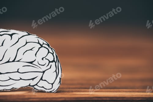 Preview: close up of paper with brain shape as alzheimer symbol