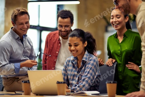 Preview: Group of happy multiracial business people looking at laptop screen, discussing project results and