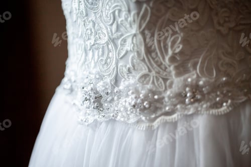 Preview: new Wedding dress detail photo. Detail of an elegant white wedding dress