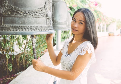 Preview: Thai woman visiting a buddhist temple