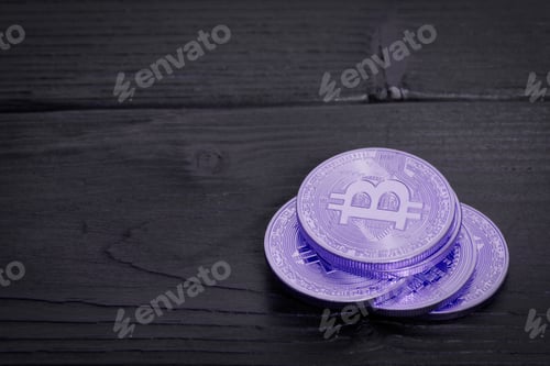 Preview: Violet Bitcoins on a table
