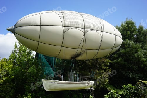 Preview: Beautiful shot of a white airship surrounded by lush nature