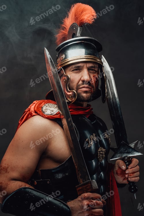 Preview: Roman champion poses with swords in dark background