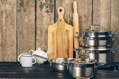Preview: Set of dishware against old wooden background