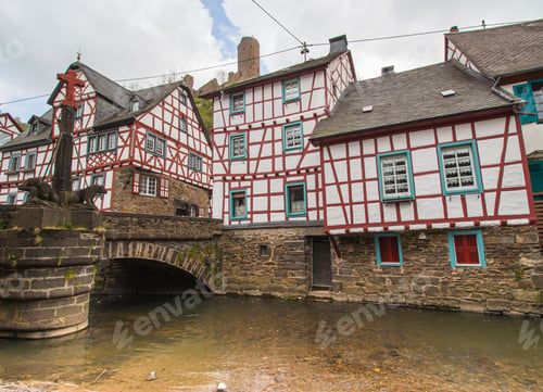 Preview: Beautiful traditional buildings next to a river in Monreal, Germany