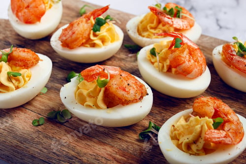 Preview: Boiled eggs stuffed with yolk and seasoned with mayonnaise, stuffed eggs with shrimp,