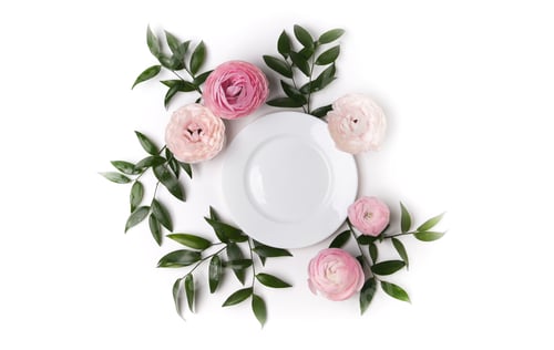 Preview: top view of beautiful table setting with flowers and white plate