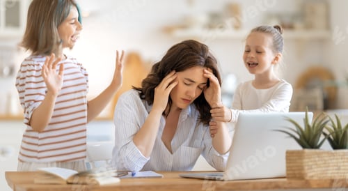 Preview: woman working on a laptop at home